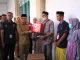 Didampingi Tim Kemensos, Bupati Polman Serahkan Bantuan untuk Korban Kebakaran