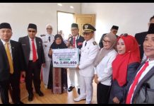 Bupati Polman Serahkan Bantuan ATENSI Kemensos kepada Penyandang Disabilitas di Kelurahan Darma